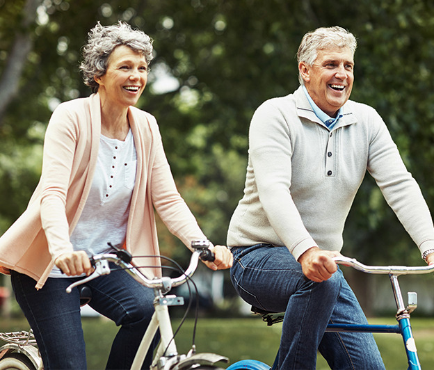 senior couple riding bikes