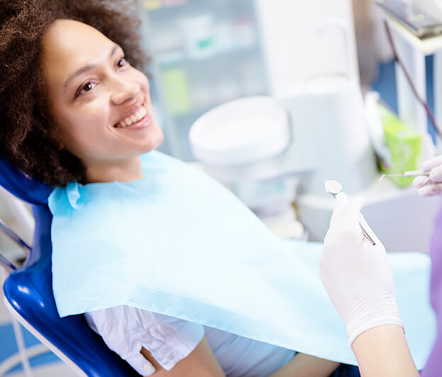 woman about to receive a dental exam